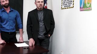 Sexy hunk gets double dicked by horny daddies in classroom