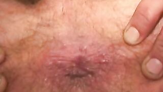 Tattooed mature given a blowjob and anal fingering