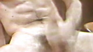 Muscular and athletic retro man masturbates and cums solo