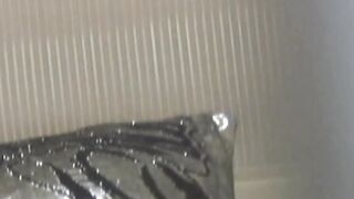 Young Japanese babe filmed fingering pussy in secret