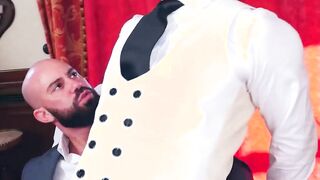 Man with a beard Bruno Max hammering a youthful butler Ruslan Adam