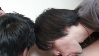 Young Japanese cocksuckers sharing during threesome