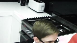 Twink maid with glasses fucked by bald guy in kitchen
