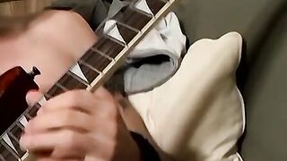 Straight guy playing guitar and jacking off his hairy cock
