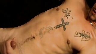Straight tattooed dude smokes cigars while jacking off