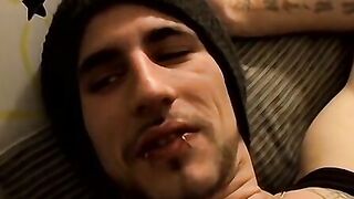 Straight tattooed dude smokes cigars while jacking off