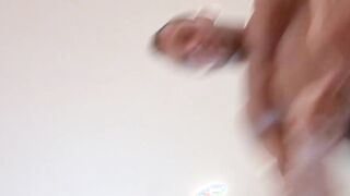Huge muscular dude strips naked and plays with his cock