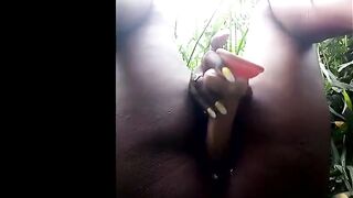 Village women putting toy into her twat inside the wild