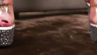 Seductive tranny shows off feet before masturbating wildly