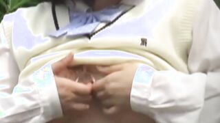 Japanese student plays with her tits while pissing in nature