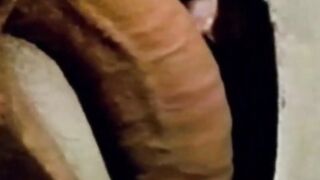 Exemplary gay stud shows his deepthroating abilities in latrine