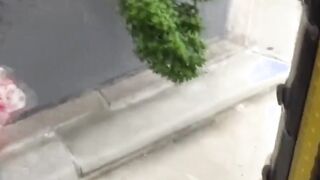 Teen Asian redhead shot while peeing in the city