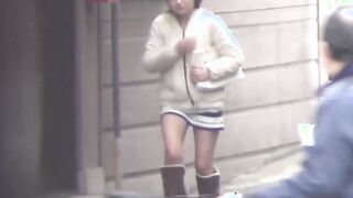 Close up video of Japanese girls pissing in public toilet