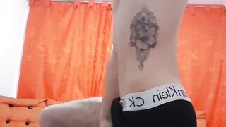 Inked Latino twink jerks off solo for a popping cumshot