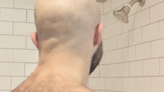 Atlas Grant shows off that bear body and tugs on his dick