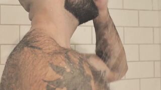 Atlas Grant shows off that bear body and tugs on his dick
