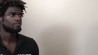 An intruder is apprehended by a security guard who brutally beats him