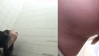 Naughty Japanese babe fingers her pussy in public toilet
