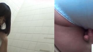 Naughty Japanese babe fingers her pussy in public toilet