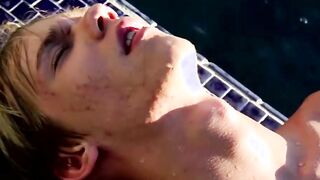 Near the pool blonde twink Tyler Thayer jerks his cock