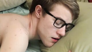 Cute twink sprays cum on lovers chest while riding bare BBC