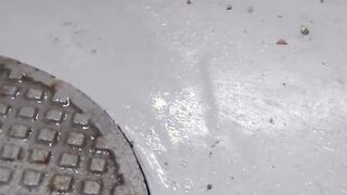 Japanese chick takes off her dress to piss outside in public