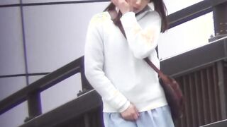 Japanese chick takes off her dress to piss outside in public