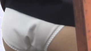 Cute Japanese chick rubs her pussy before pissing herself
