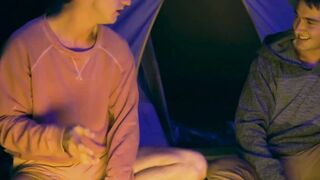 Lively stepbrother beat crude before a setting up camp fire