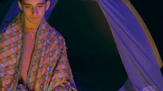 Lively stepbrother beat crude before a setting up camp fire