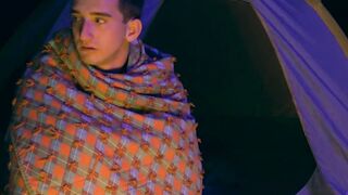Lively stepbrother beat crude before a setting up camp fire