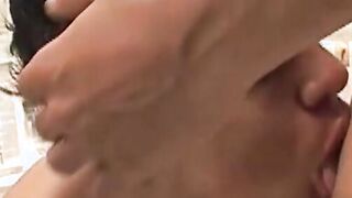 Young Latino wears protection glasses while riding cock