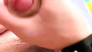 Beautiful young man tugging and stroking his hard cock
