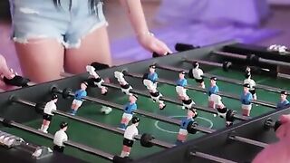 Mia Trejsi and her bf Charlie Dean are having fun at Christmastime. They play foosball together, with Mia celebrating every point she scores by bouncing up and down with her melons clearly jiggling. After she wins, she comes over to sooth Charlie's p