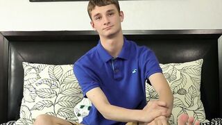 Innocent looking twink masturbates with a dildo up his bum