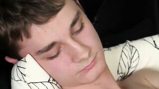 Innocent looking twink masturbates with a dildo up his bum