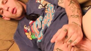 Tattooed straight thug plays with his small dick and cums