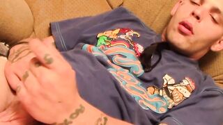 Tattooed straight thug plays with his small dick and cums
