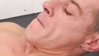 Muscular daddy ambushes twink in a shower and bangs him raw