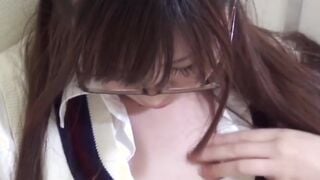 Japanese with glasses secretly filmed fingering her pussy