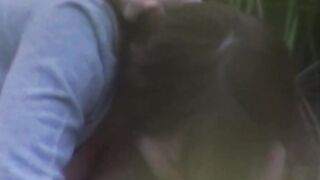 Japanese cutie caught on cam sucking and riding cock outside