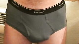 Rough older guy strips naked and tugs on his big hard cock