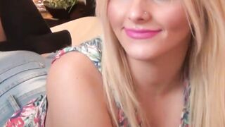 Beautiful blonde with make up posing on webcam
