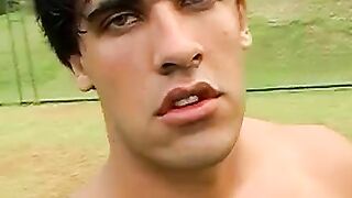 Horny Brazilian muscle head yanking off his pounding dick outside