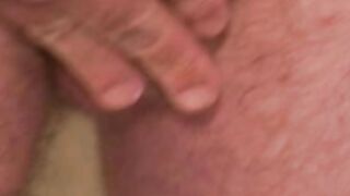 Tattooed mature guy jerks off his hard meat and cums loads