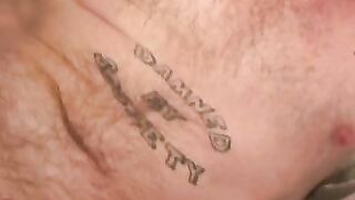 Tattooed guy shows off his buff body before tugging his meat