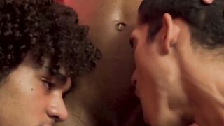 Just prior to interracial drilling two gay men suck a large black penis