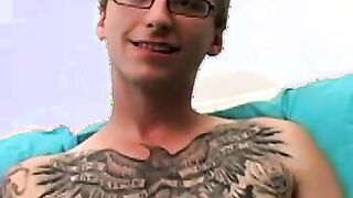 Amateur tattooed twink fingers his ass and masturbates solo