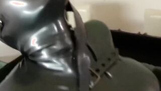 Fetish chick locked inside a box having sex before getting a facial