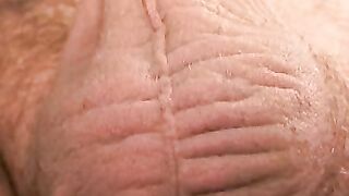 Hairy older homo jerks off wildly before releasing his semen